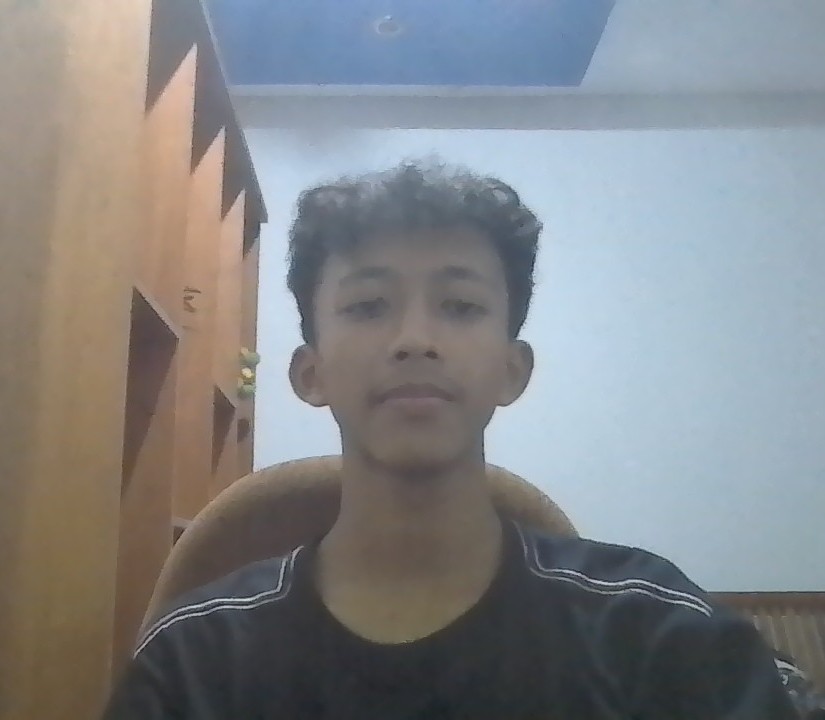 Professional portrait of a full stack developer with a modern office background